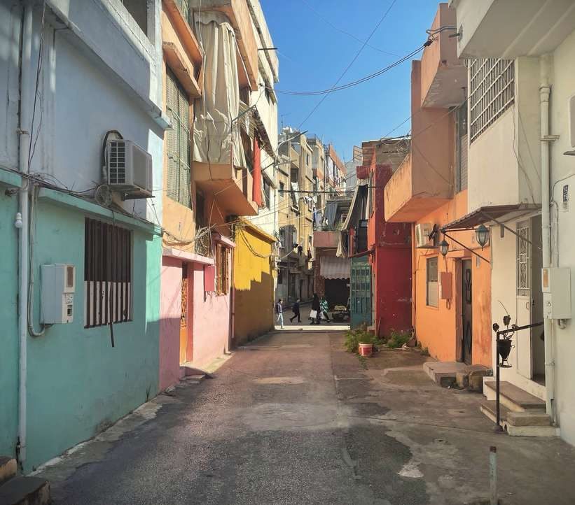 A painted alleyway in warm light